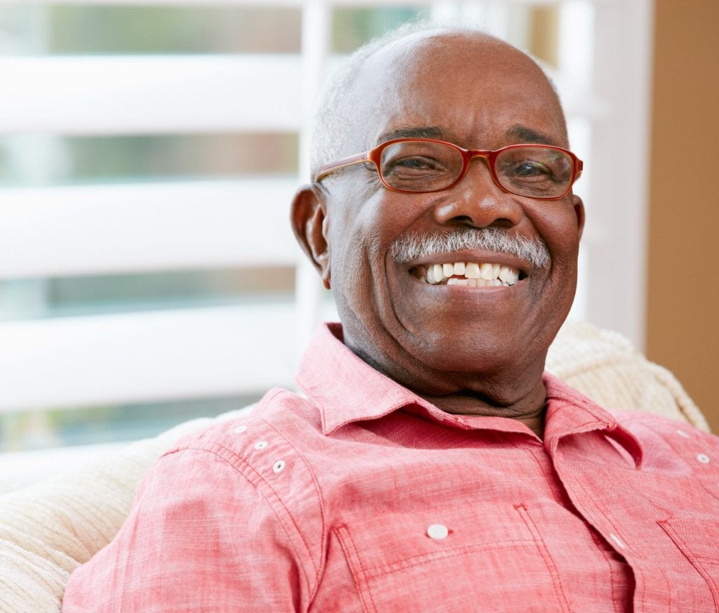 Older man happy after receiving financial support