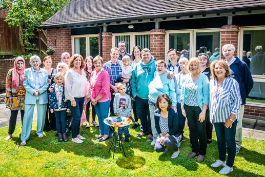 Group of volunteers and guests at the event