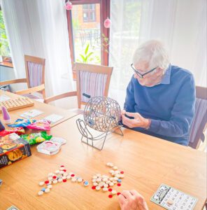 A resident playing Bingo on National Bingo Day.