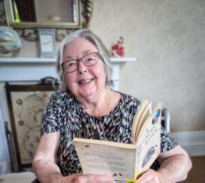 A resident with a book.