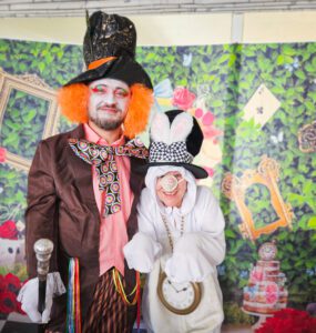 Two staff members dressed as The Mad Hatter and the Rabbit. 