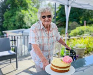 Ruth on her birthday with cake.