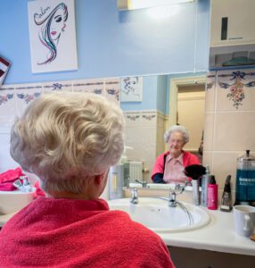 A Redcot resident during their hairdressing appointment.