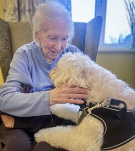 Joan cuddling Jazz. 