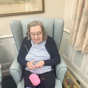 A resident knitting. 