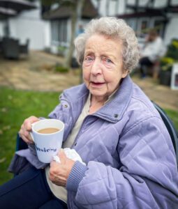 Margaret with a cup of tea.