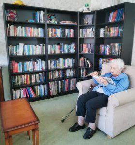 A resident reading on World Book Day. 