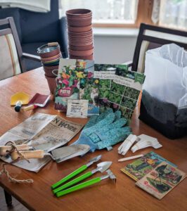 An assortment of seeds and pots. 