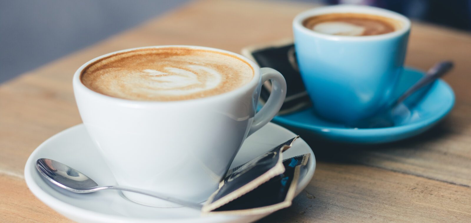 Two cup of coffee on the table. Close up.