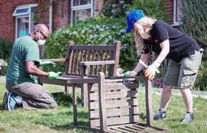 Access Volunteers David and Sherri sanding benches