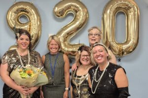 Woking Day Care Manager, Fran Simpson (left) with Chief Executive, Rachel Hill and the Care Team 